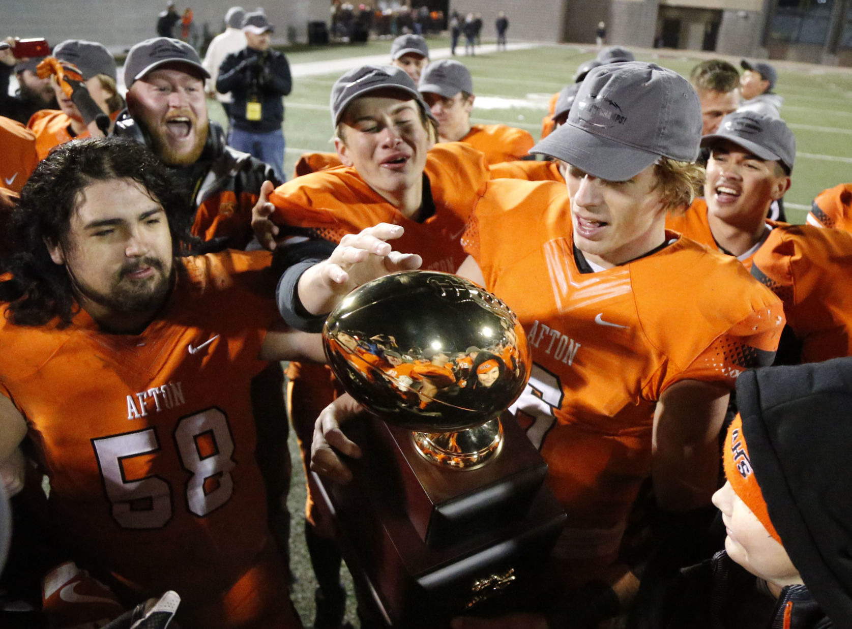 Do all Oklahoma football state champions, Class 6AI to C, get the same style of trophy?